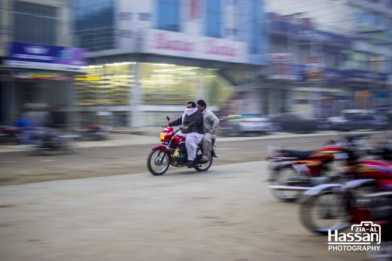 Motion Blur Of A Motorcycle On Road