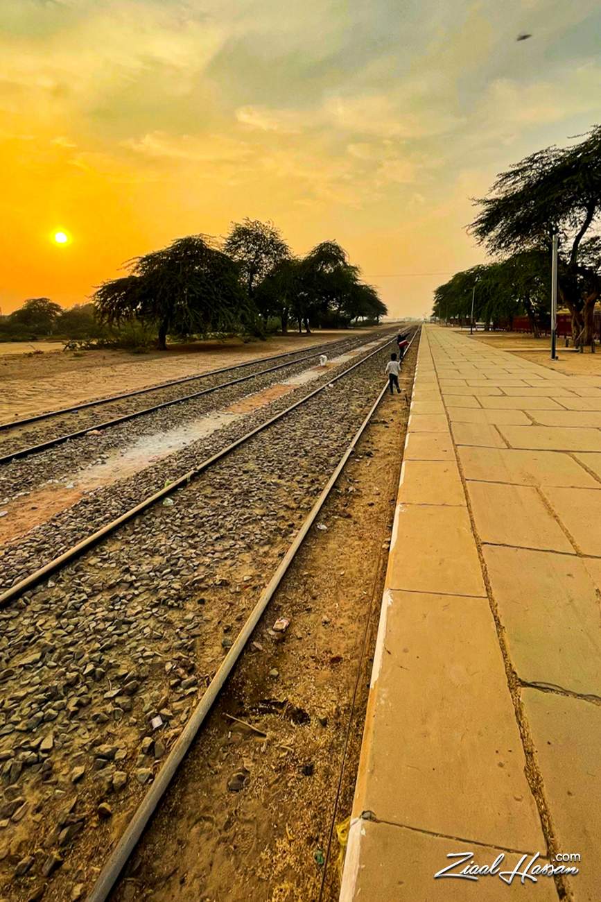 Golden Sunset Over Rural Railway Tracks at a Local Station - Dr. Zia-al-Hassan Photography