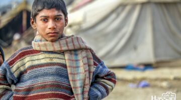 Child Of A Labor Woman In His Hut House Under open Sky