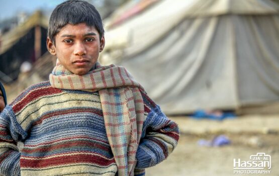 Child Of A Labor Woman In His Hut House Under open Sky