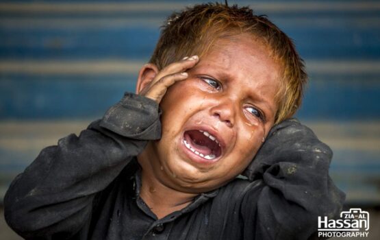 Poor Boy Weeping After Loosing His Mother In A Crowd