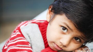 Innocent Child In Red Sweater