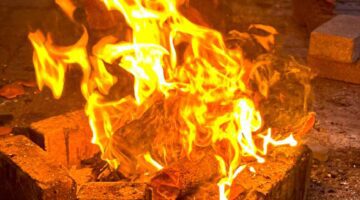 Traditional Brick Fire Pit with Bright Glowing Flames - Dr. Zia-al-Hassan Photography