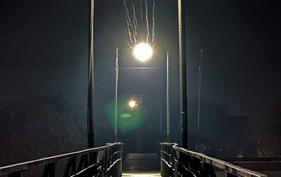 Atmospheric Pedestrian Bridge at Night with Industrial Lighting - Dr. Zia-al-Hassan Photography
